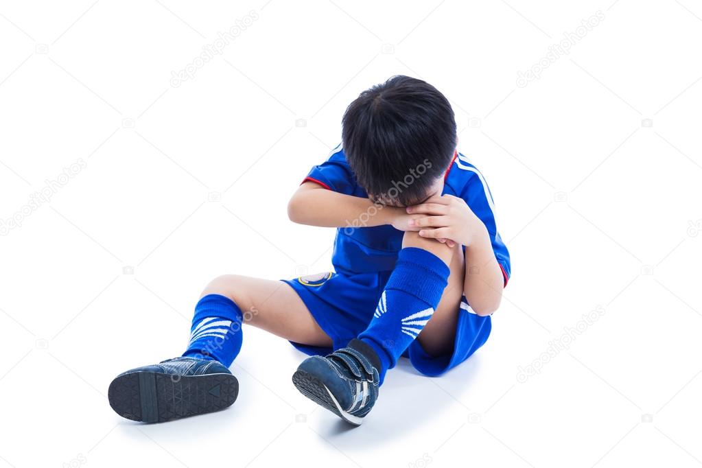 Youth asian soccer player cry for painful knee injury. Full body
