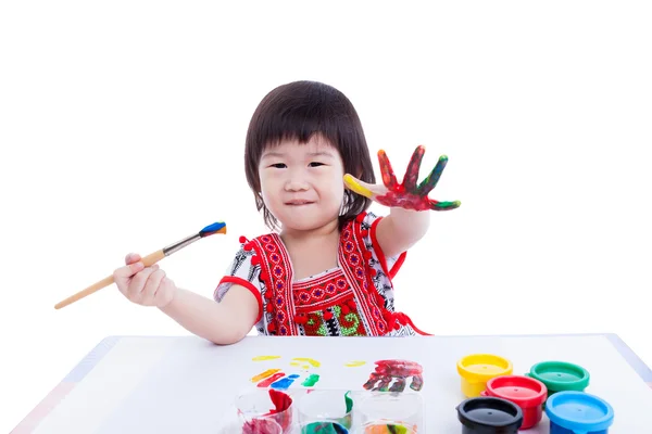 Ragazza asiatica dipingere la mano, concetto di creatività. su bianco Fotografia Stock