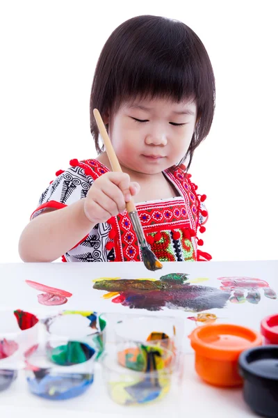Asiatico ragazza pittura e utilizzando disegno strumenti Immagine Stock