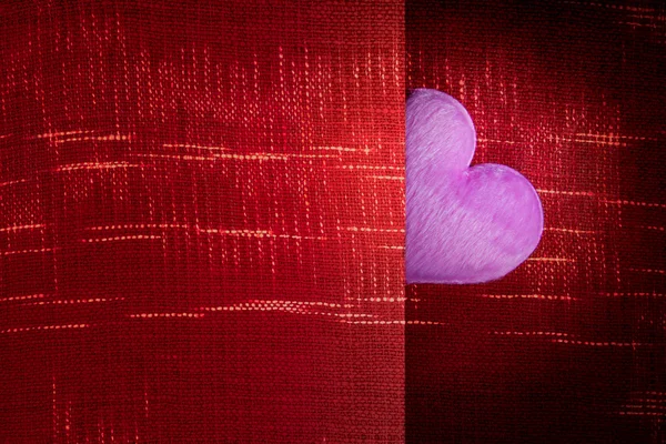 Pink heart with red fabric background blank space for a Valentin — Stockfoto