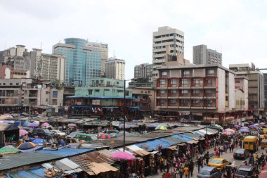 close up image of shops and shoppers at Idomuta market Lagos, Nigeria clipart