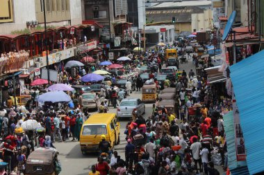 Image of a typical shopping hour during Christmas in idomuta Lagos island clipart