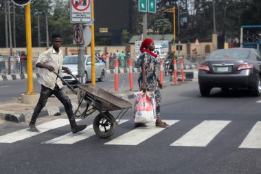 will barrow at zebra crossing at Maryland, Lagos Nigeria clipart