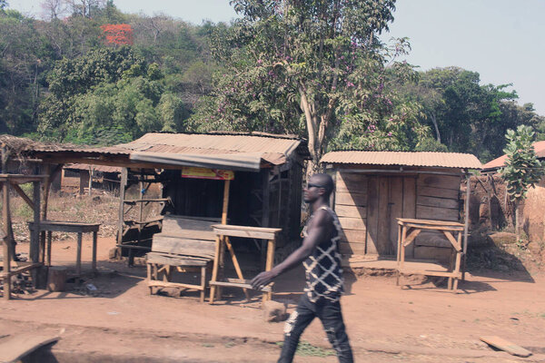 Young man in sun glass doing brisk work in Ekiti town Western Nigeria 
