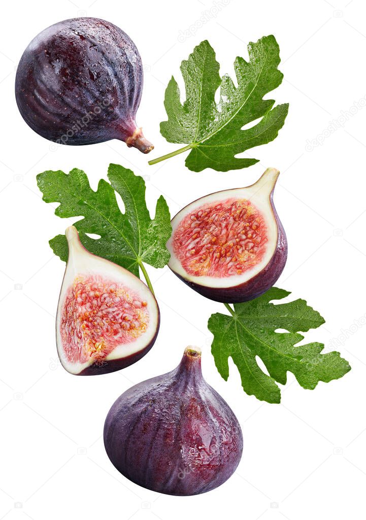 Creative layout with ripe flying fig halves on light background. Healthy food, diet, tropical exotic fruit, trendy food product. Organic fig