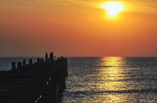 Fishing pier at sunrise — Stock Photo, Image