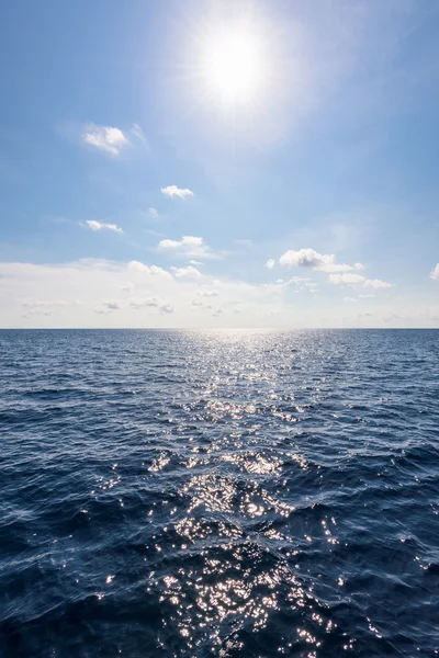 Sun on blue sky and sea in summer Thailand