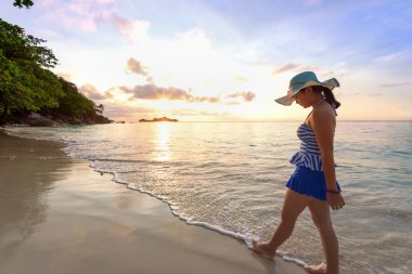 Girl on the beach at Similan Island, Thailand clipart
