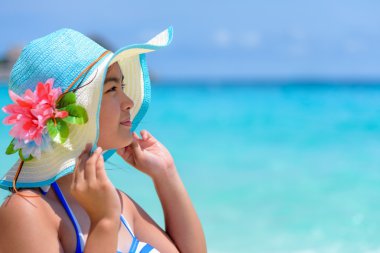 Face woman is happy with the sea in Thailand clipart