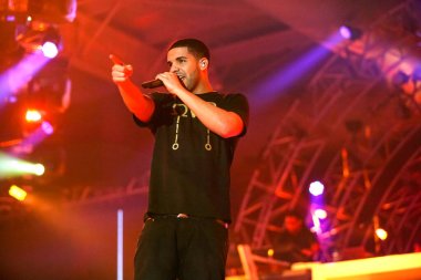 Johannesburg, South Africa - December 09, 2011: Singer Songwriter Drake live in concert on stage with backing band