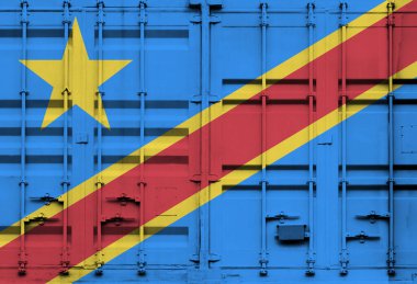 DRC ulusal bayrağı taşıyan konteyner, küresel ticaret bağlamında gümrük tarifeleri ve uluslararası ticaret politikalarını simgeliyor