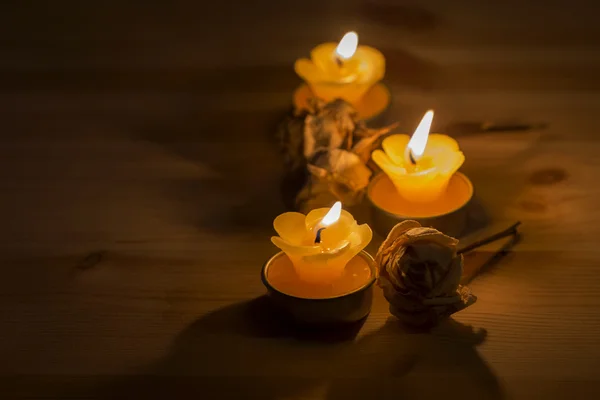 Aroma candles and dried roses — Stock Photo, Image