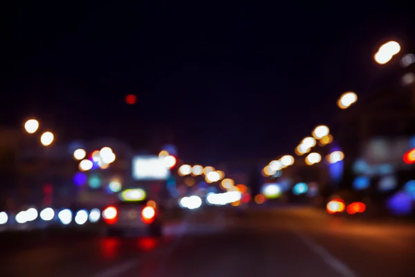 Blurred night background, city road — Stock Photo, Image
