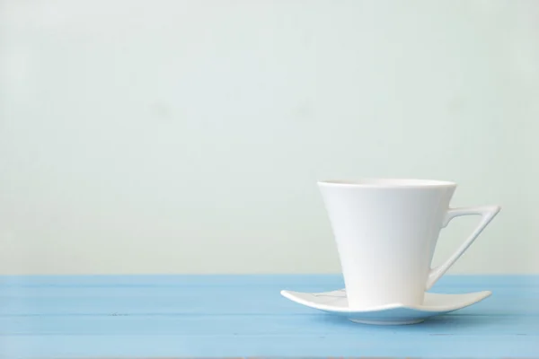 Stock Photo Tasse à café sur des tables en bois - images de style effet vintage — Photo