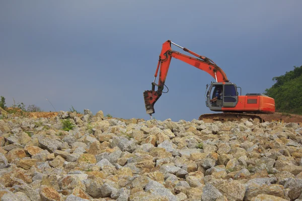 Backhoe em um canteiro de obras — Fotografia de Stock