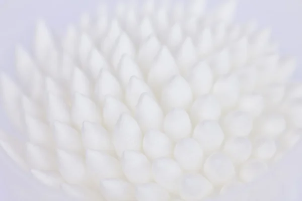 Close up of cotton buds heads, showing the soft fibers.