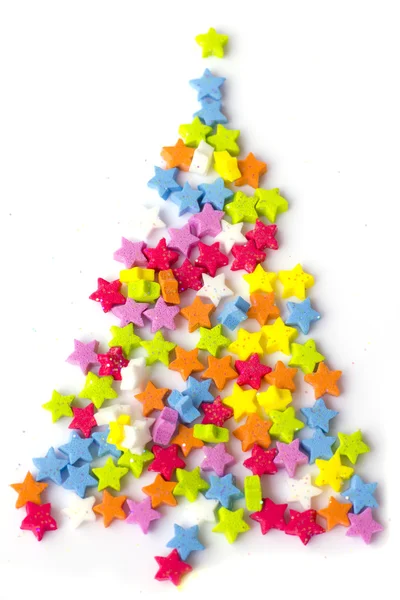 新的一年的毛皮-树-白色背景上的小明星纸屑 — 图库照片