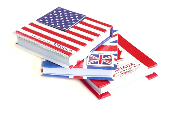 Estados Unidos, bandera británica, canadiense en el cuaderno - Stock Image — Foto de Stock