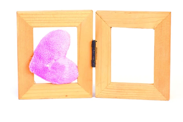 Purple fabric hearts on wood frame - Stock Image — Stock Photo, Image