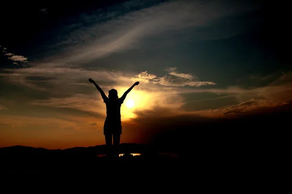 Woman and sunset - Stock Image — Stock Photo, Image