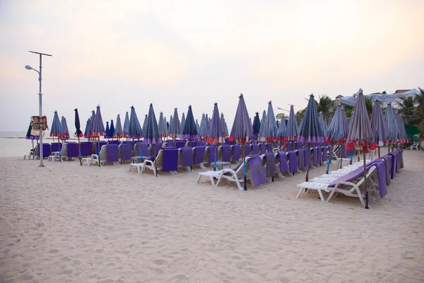Chairs and umbrella on tropical beach ,Thailand - Stock Image — Stock Photo, Image