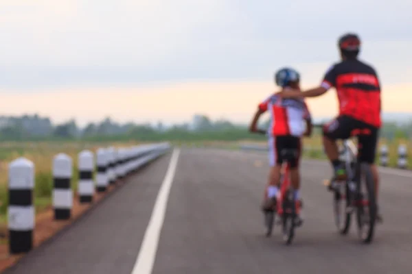 Stock Photo - Cyclistes en compétition avec le flou du mouvement Photos De Stock Libres De Droits