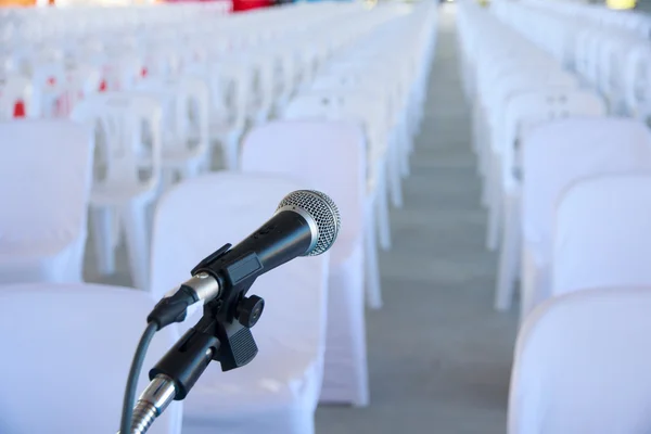 Stock Photo - Close up of microphone in conference room