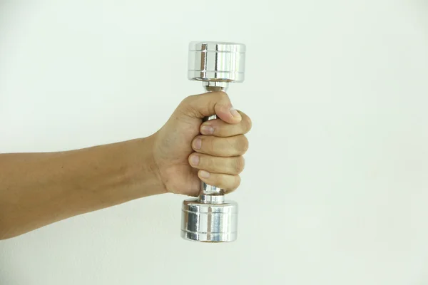 Voorraad foto stalen dumbell op de houten vloer — Stockfoto