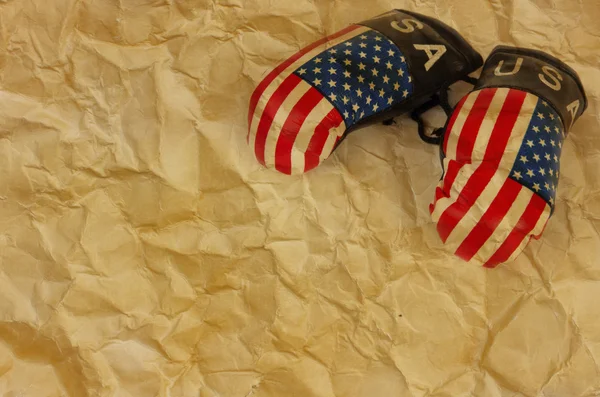 Pair of usa boxing gloves on the old vintage paper texture for t — Stock Photo, Image