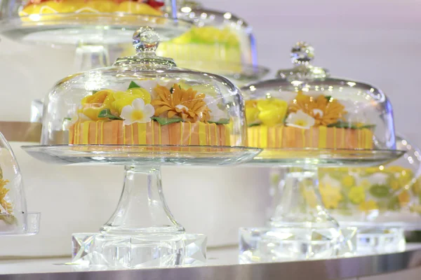 Stock Photo cake on cake stand under glass dome — Stock Photo, Image