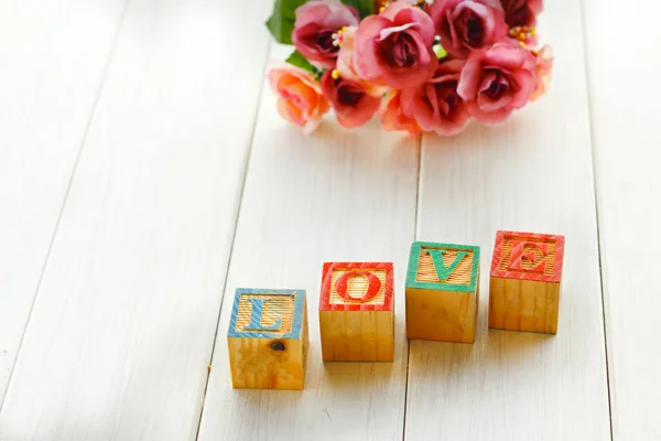 Stock Photo Love message written in wooden blocks. — Stock Photo, Image