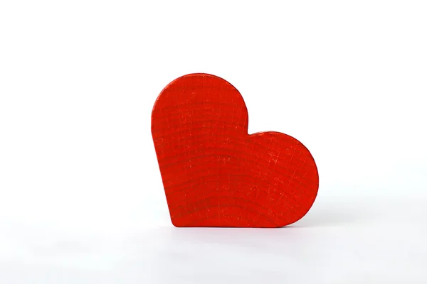 Stock Photo Red wooden heart on a wooden background — Stock Photo, Image