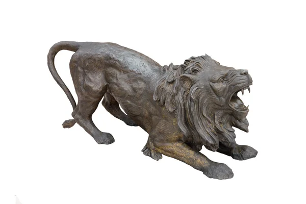 Stock Photo : une sculpture de lion de cuivre — Photo