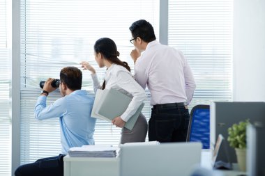 People looking through the office window clipart