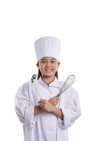 Meisje in uniform van de chef-kok — Stockfoto