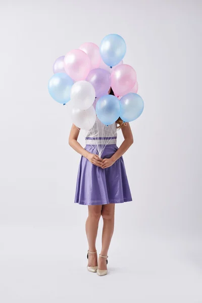Menina com balões coloridos — Fotografia de Stock