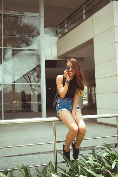 Attractive girl having phone call — Stock Photo, Image