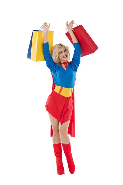 Superwoman sollevamento con borse della spesa — Foto Stock