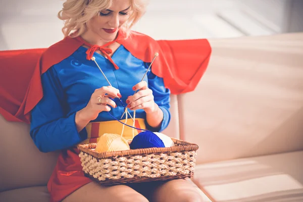 Superwoman knitting at home — Stock Photo, Image