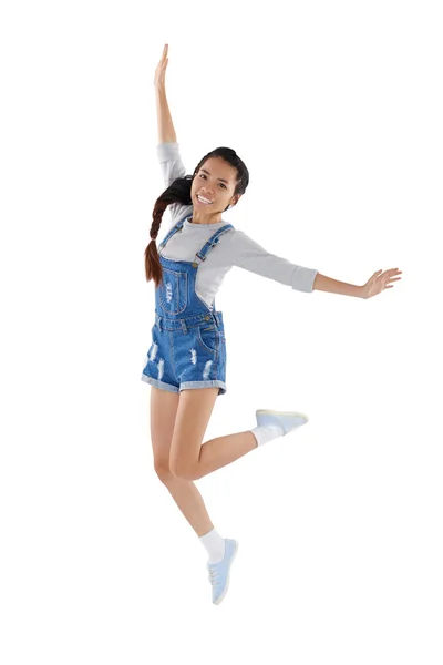 Asiatico ragazza in tuta intera jumping — Foto Stock