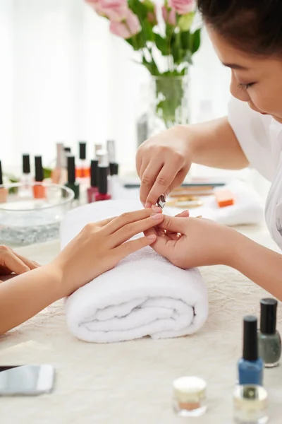 Professional manicure in beauty salon — Stock Photo, Image