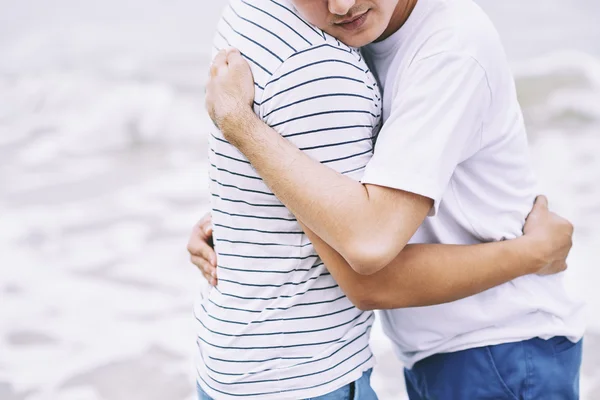 Embracing male couple — Stock Photo, Image