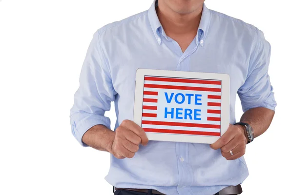 Man with vote here text on tablet — Stock Photo, Image