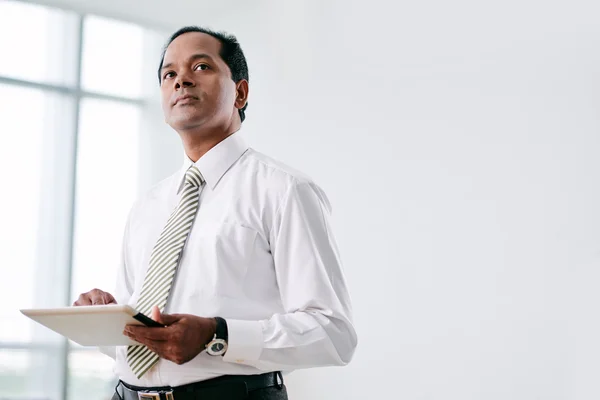 Indian businessman with digital tablet — Stock Photo, Image