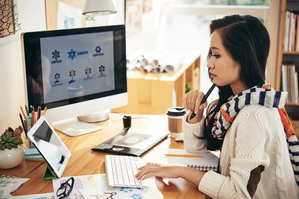 Designer working on project in studio — Stock Photo, Image