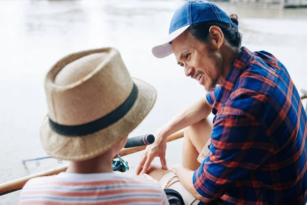 Happy Mature Asian Man Spending Weekend Son Lake Fishing Talking — Stock Photo, Image