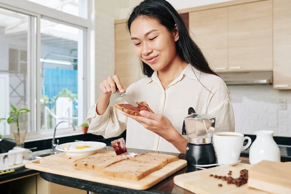 Cheerful Young Woman Making Jelly Sandwich Breakfast — Stock Photo, Image