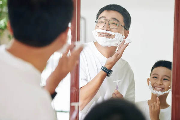 Smiling Mature Man His Teenage Son Looking Mirror Applying Shaving — Stock Photo, Image