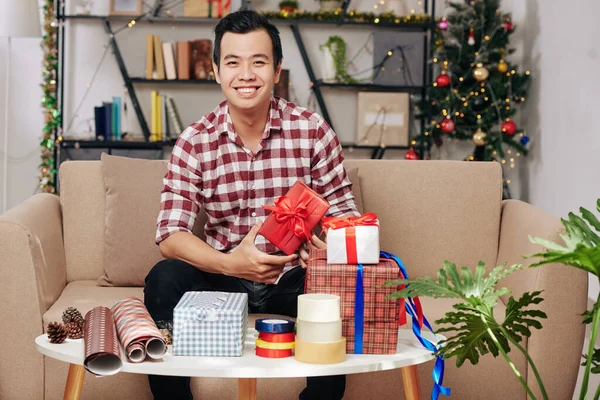 Happy Handsome Young Vietnamese Man Wrapping Christmas Presents Friends Family — Stock Photo, Image