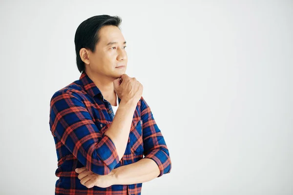 Portrait Pensive Mature Vietnamese Man Plaid Shirt Looking Away Isolated — Stock Photo, Image